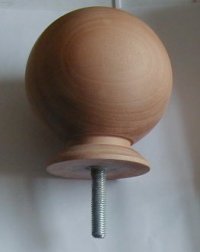 Ball newel cap in mahogany, on metal thread.
